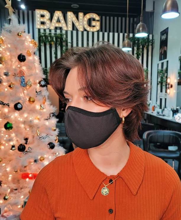 Choppy Short Wolf Cut with Thick Curtain Bangs