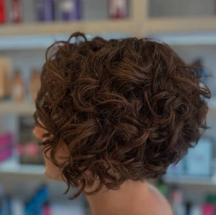 Curly Bob with Side-Swept Bangs