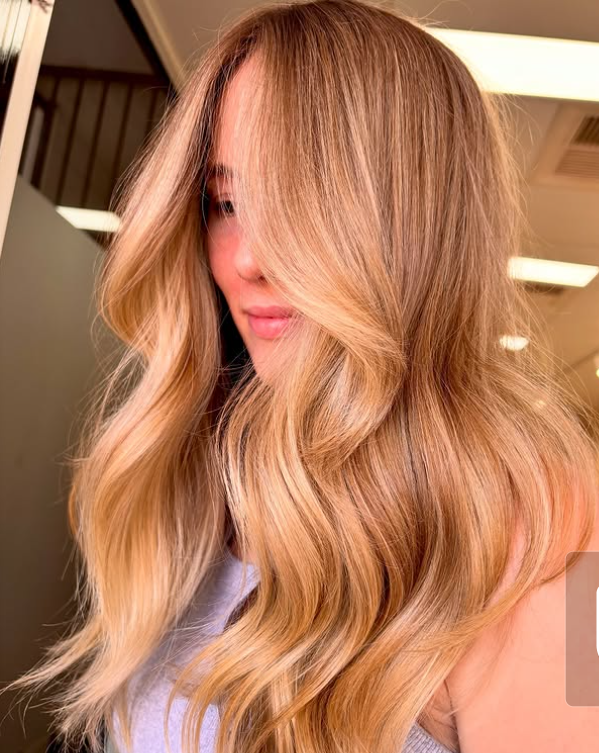 Soft Curls with Deep Side Part