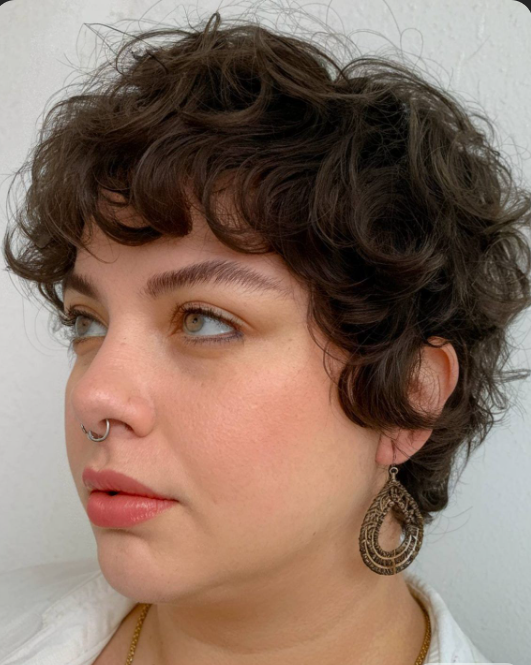 Ringlet Pixie Cut with Chestnut Highlights