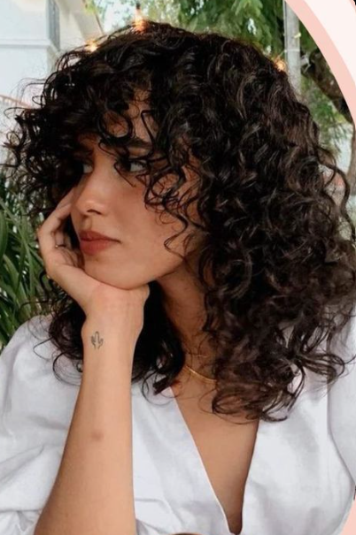 Rounded Layered Curly Cut